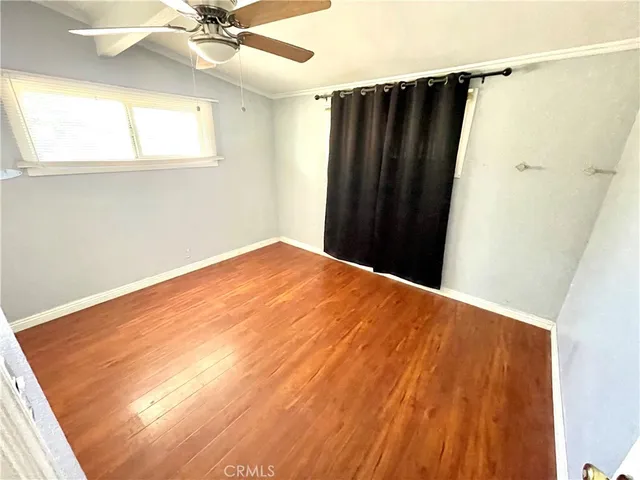 a view of a room with a window