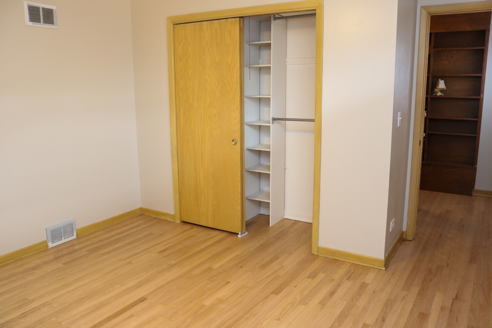 401 Dewey Avenue Evanston, IL 60202 - Photo 15 of 20 a view of empty room with wooden floor
