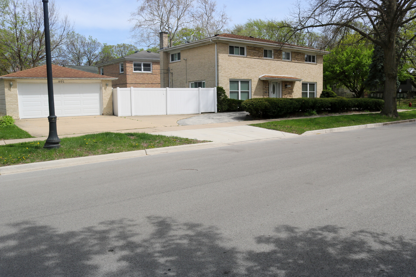 401 Dewey Avenue Evanston, IL 60202 - Photo 2 of 20 a view of house with outdoor space and parking
