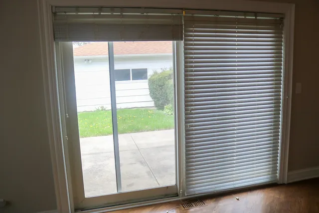 a view of a room that has a window