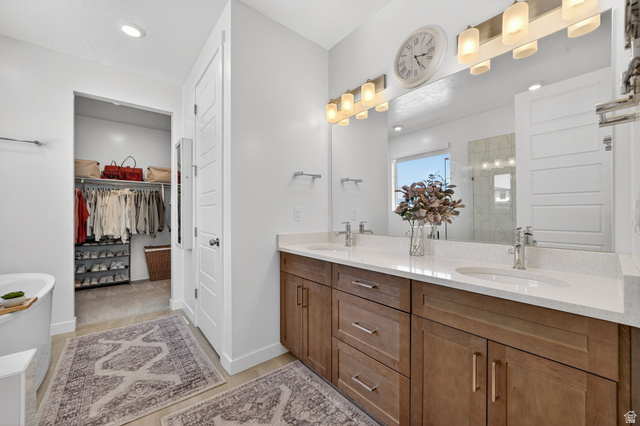 1165 West Union Bench Drive Mapleton, UT 84664 - Photo 24 of 61 Dual wood-finish vanities with undermount sinks and light-toned countertops