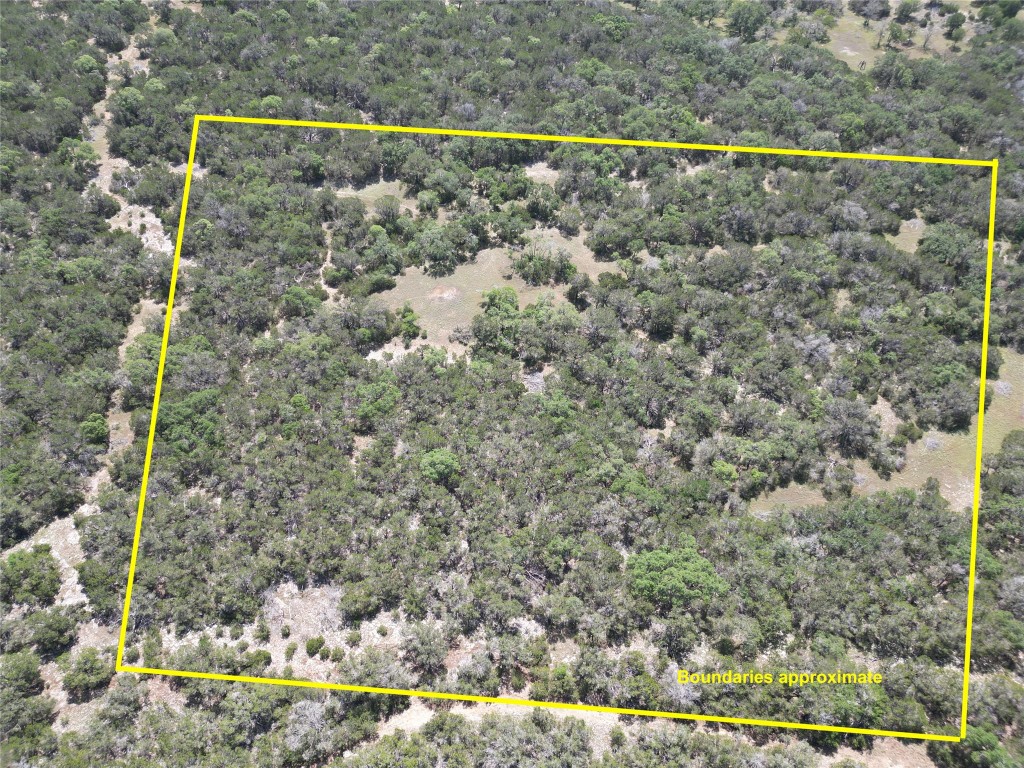 2-10 Acres Cambridge Road Wimberley, TX 78676 - Photo 13 of 13 a view of a yard with wooden fence