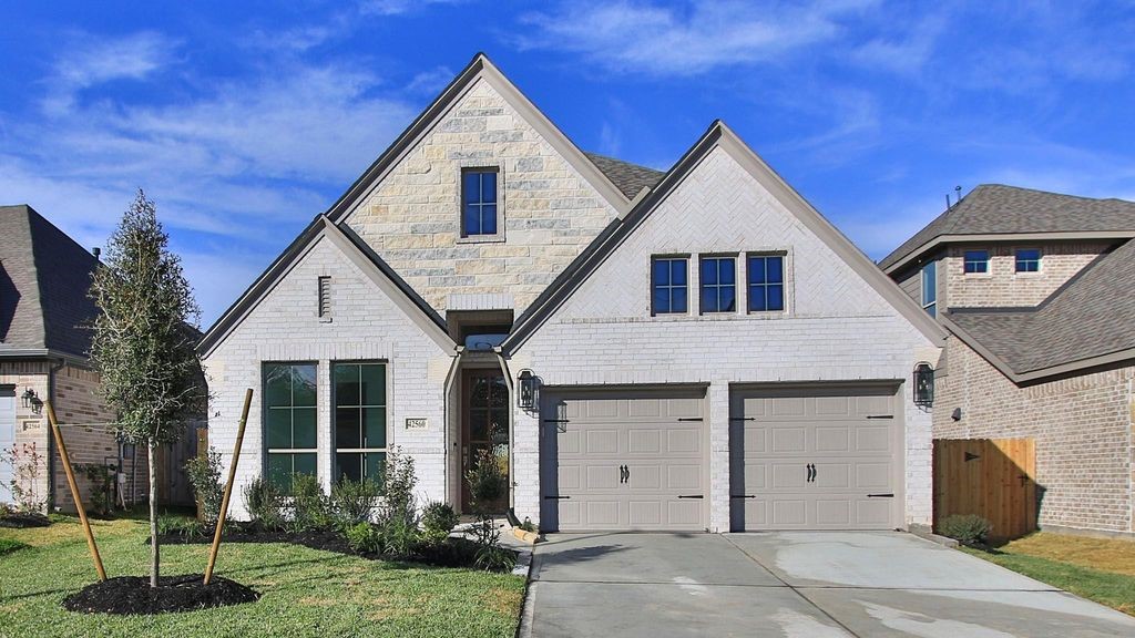 42560 Rustico Road Magnolia, TX 77354 - Photo 1 of 22 a view of house with yard