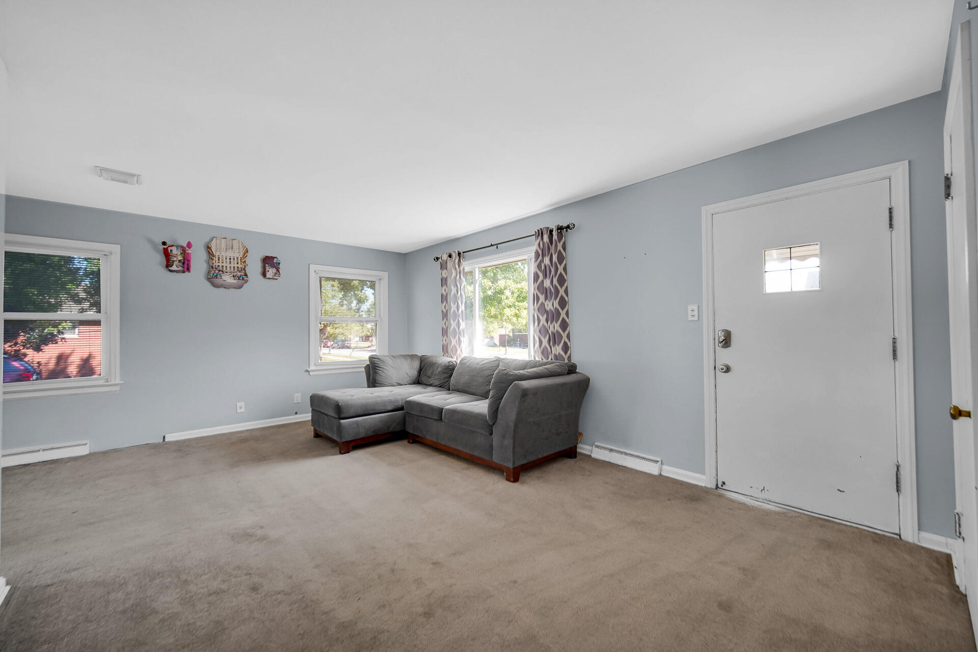 4004 Johnson Avenue Hammond, IN 46327 - Photo 4 of 18 a living room with furniture and a window