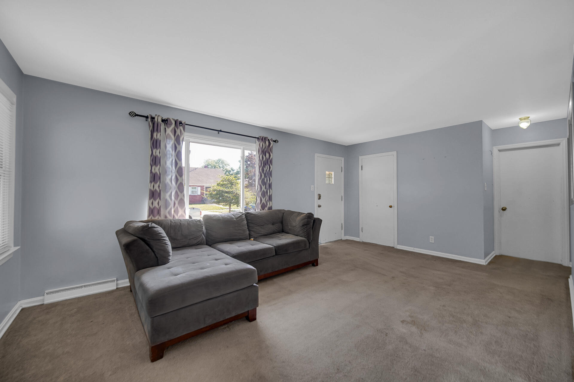 4004 Johnson Avenue Hammond, IN 46327 - Photo 6 of 18 a living room with furniture and a window