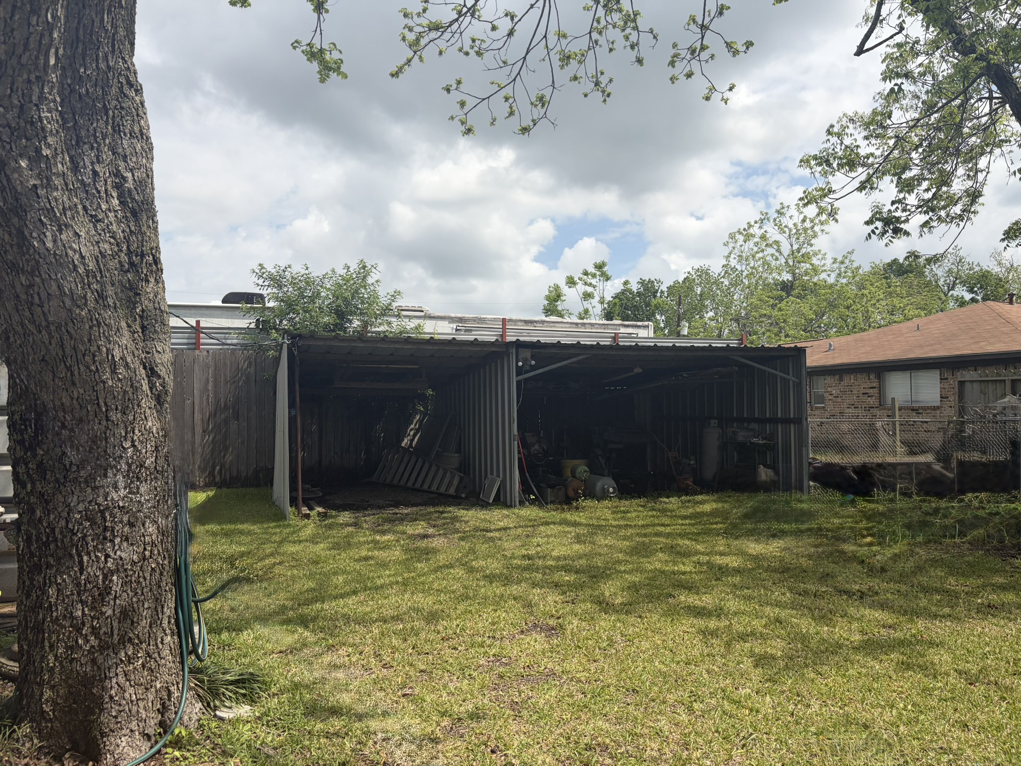 817 South Main Street Highlands, TX 77562 - Photo 13 of 17 a view of a backyard