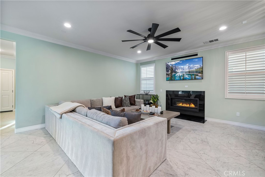 28537 Vista Del Rio Drive Valencia, CA 91354 - Photo 18 of 53 a living room with furniture and a fireplace