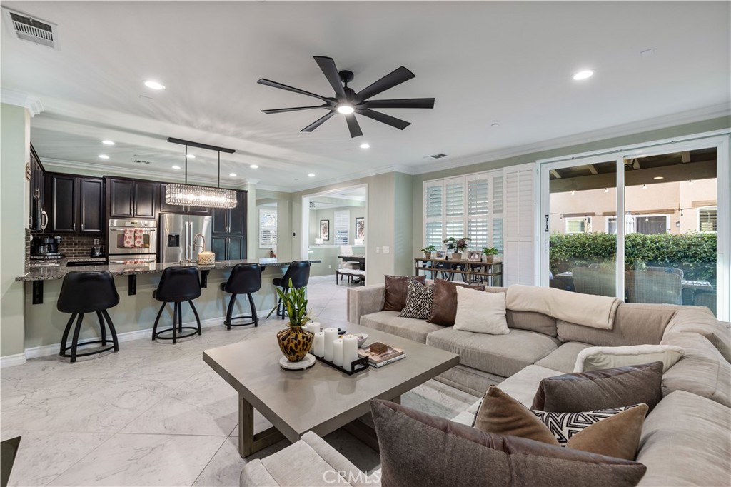 28537 Vista Del Rio Drive Valencia, CA 91354 - Photo 20 of 53 a living room with furniture and a large window