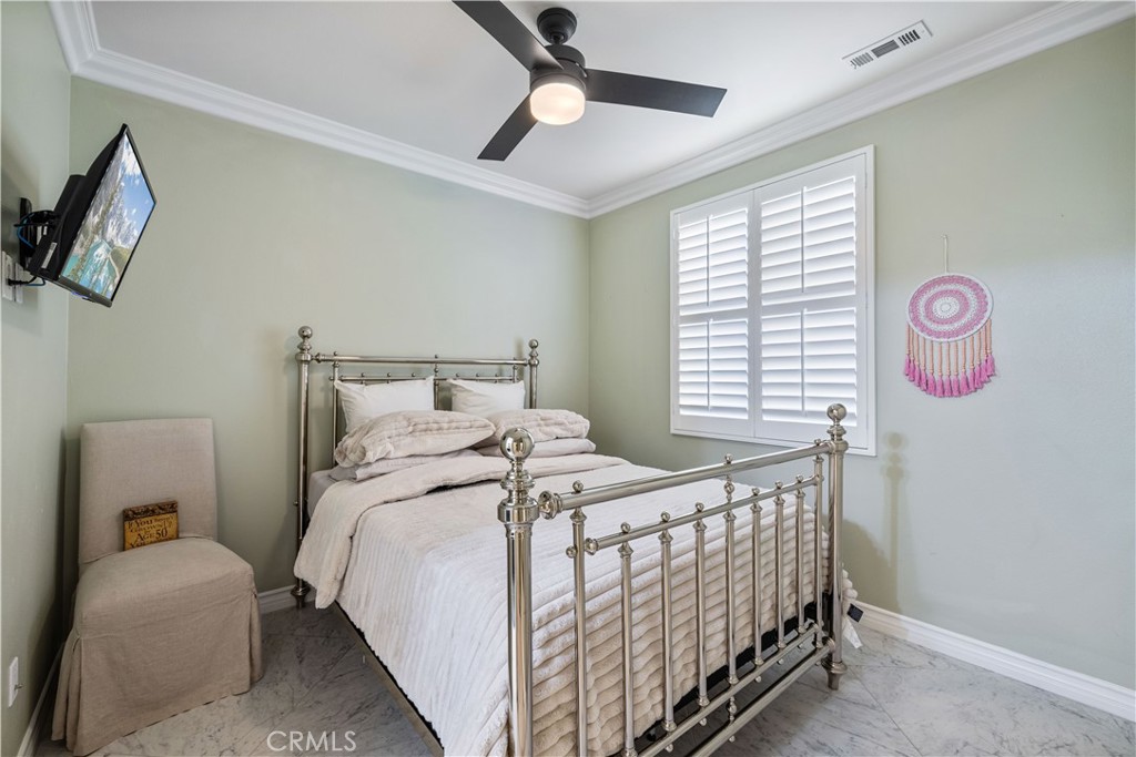 28537 Vista Del Rio Drive Valencia, CA 91354 - Photo 21 of 53 a bedroom with a bed and a window