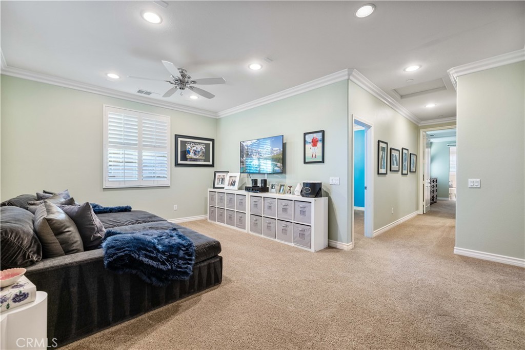 28537 Vista Del Rio Drive Valencia, CA 91354 - Photo 29 of 53 a living room with furniture and a flat screen tv