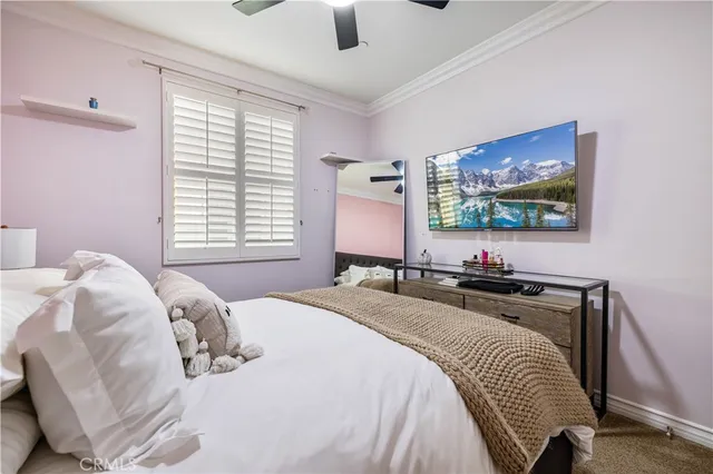 a front view of a building with outdoor seating