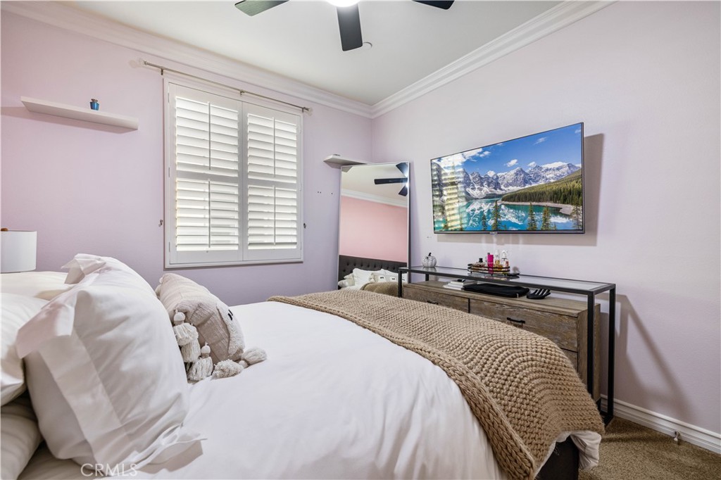 28537 Vista Del Rio Drive Valencia, CA 91354 - Photo 34 of 53 a bedroom with a bed and a flat screen tv