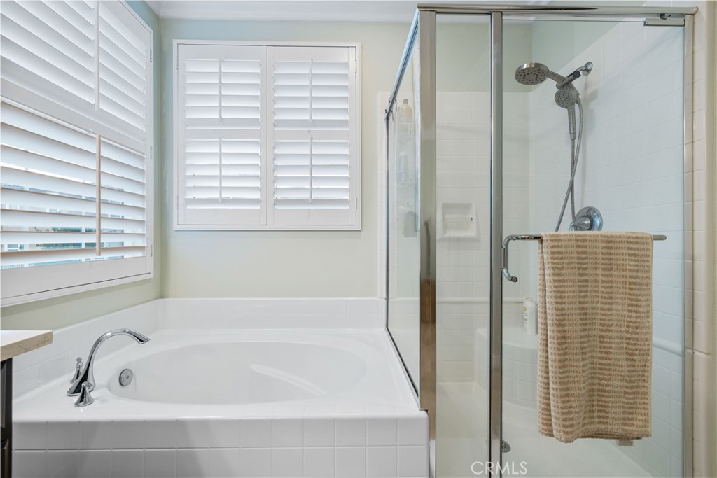 28537 Vista Del Rio Drive Valencia, CA 91354 - Photo 41 of 53 a bathroom with a bathtub and a shower