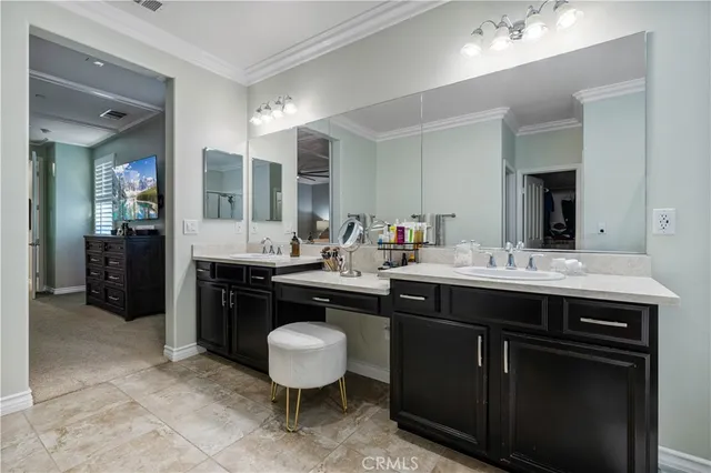 a view of a patio with table and chairs and potted plants