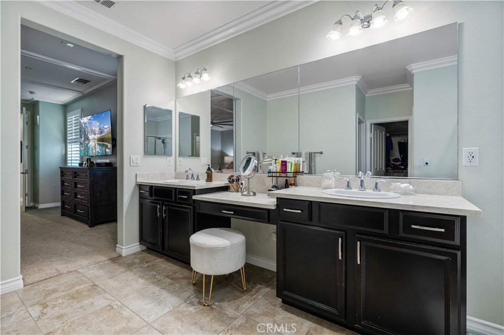 28537 Vista Del Rio Drive Valencia, CA 91354 - Photo 42 of 53 a kitchen with a sink and cabinets