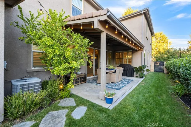 a view of a car park in front of house