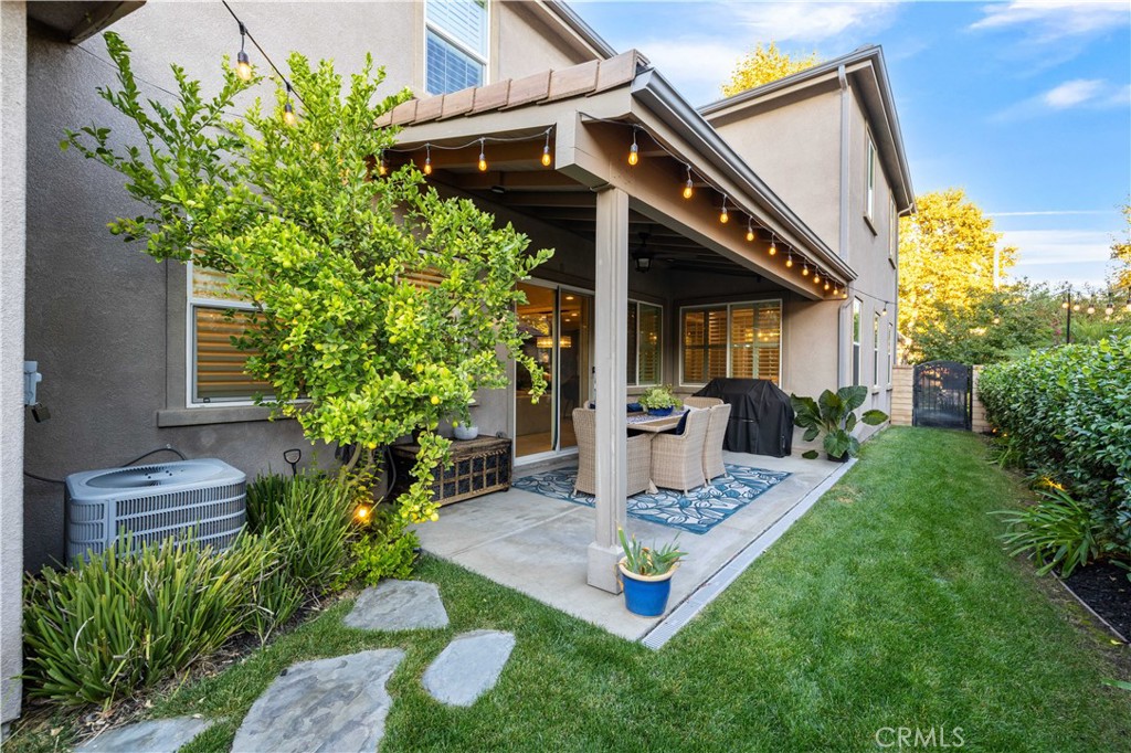 28537 Vista Del Rio Drive Valencia, CA 91354 - Photo 47 of 53 a front view of a house with garden and sitting area