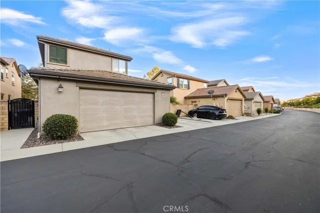 a view of a house with a garden