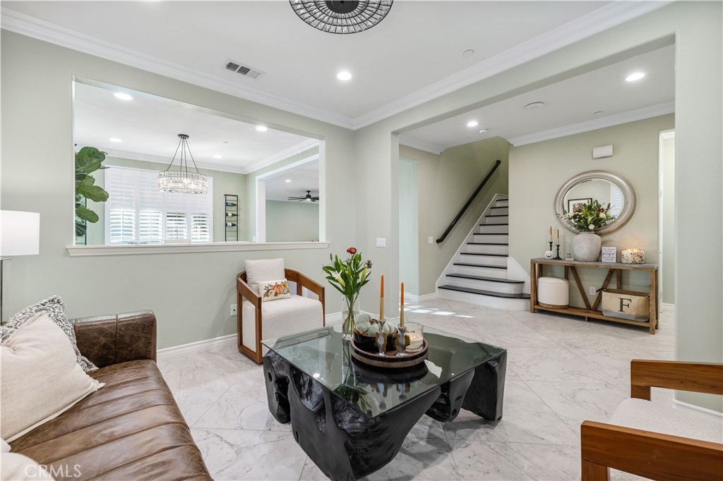 28537 Vista Del Rio Drive Valencia, CA 91354 - Photo 6 of 53 a living room with furniture and wooden floor