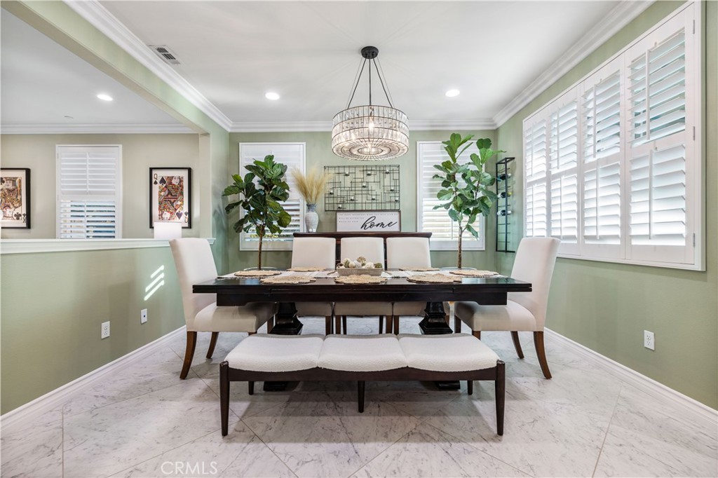 28537 Vista Del Rio Drive Valencia, CA 91354 - Photo 8 of 53 a view of a dining room with furniture window and wooden floor