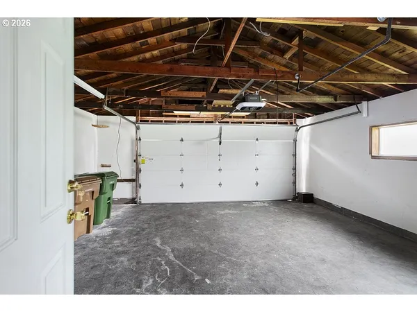 a view of a room with wooden walls