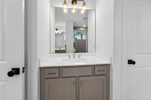 a view of a livingroom with a furniture and a ceiling fan