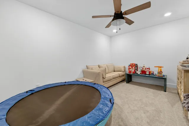 a backyard of a house with yard and outdoor seating