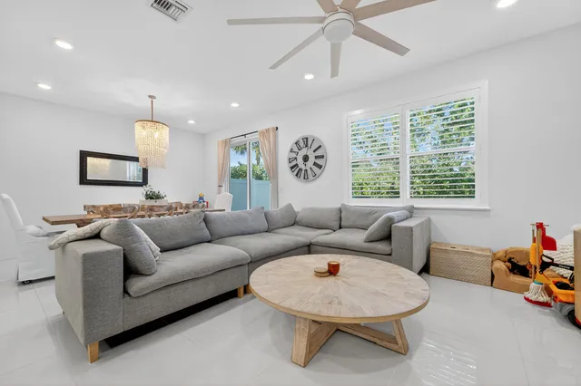 a bathroom with a sink a mirror and shower