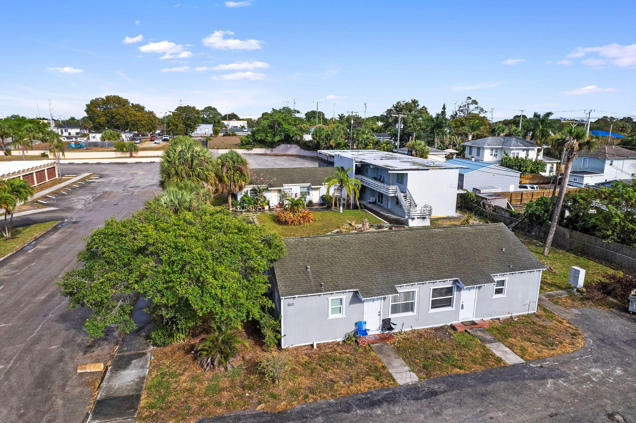 840 Almeria Road, Unit 2 West Palm Beach, FL 33405 - Photo 3 of 15 an aerial view of a house with a yard swimming pool and outdoor seating