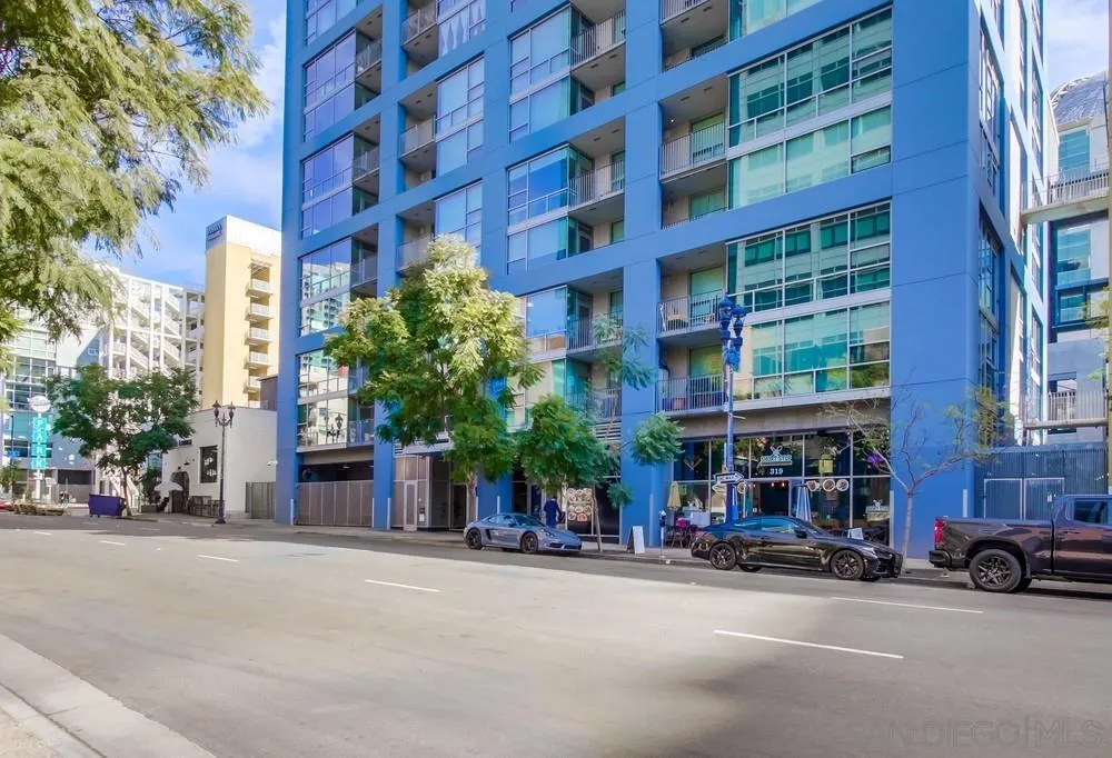 321 Tenth Avenue, Unit 903 San Diego, CA 92101 - Photo 27 of 55 a street view with building and cars parked