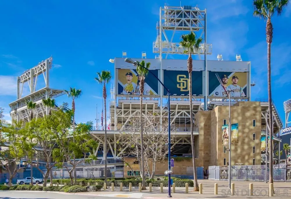 321 Tenth Avenue, Unit 903 San Diego, CA 92101 - Photo 30 of 55 a front view of a building with retail shops