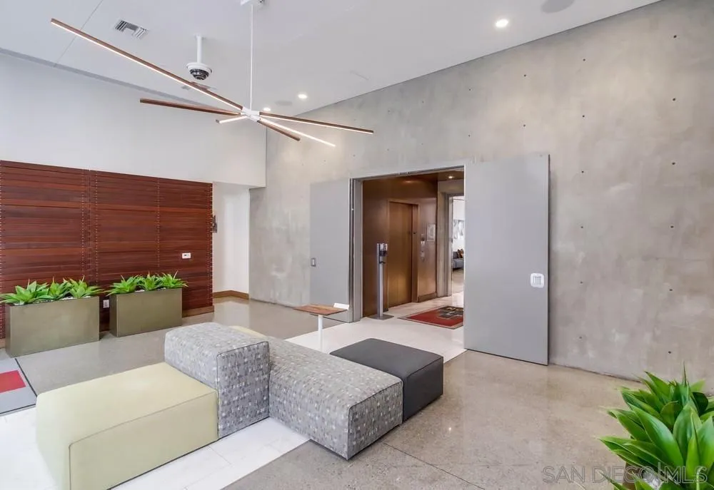 321 Tenth Avenue, Unit 903 San Diego, CA 92101 - Photo 32 of 55 a living room with furniture and a potted plant