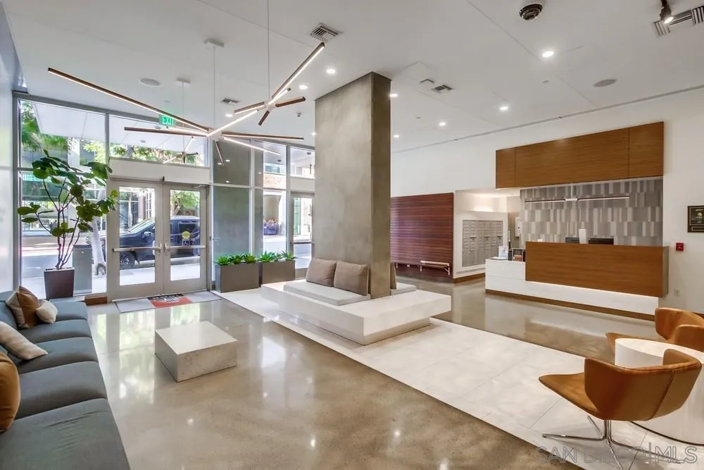 321 Tenth Avenue, Unit 903 San Diego, CA 92101 - Photo 33 of 55 a living room with furniture and a large window
