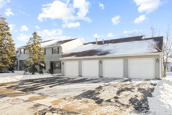 a view of a house with a snow