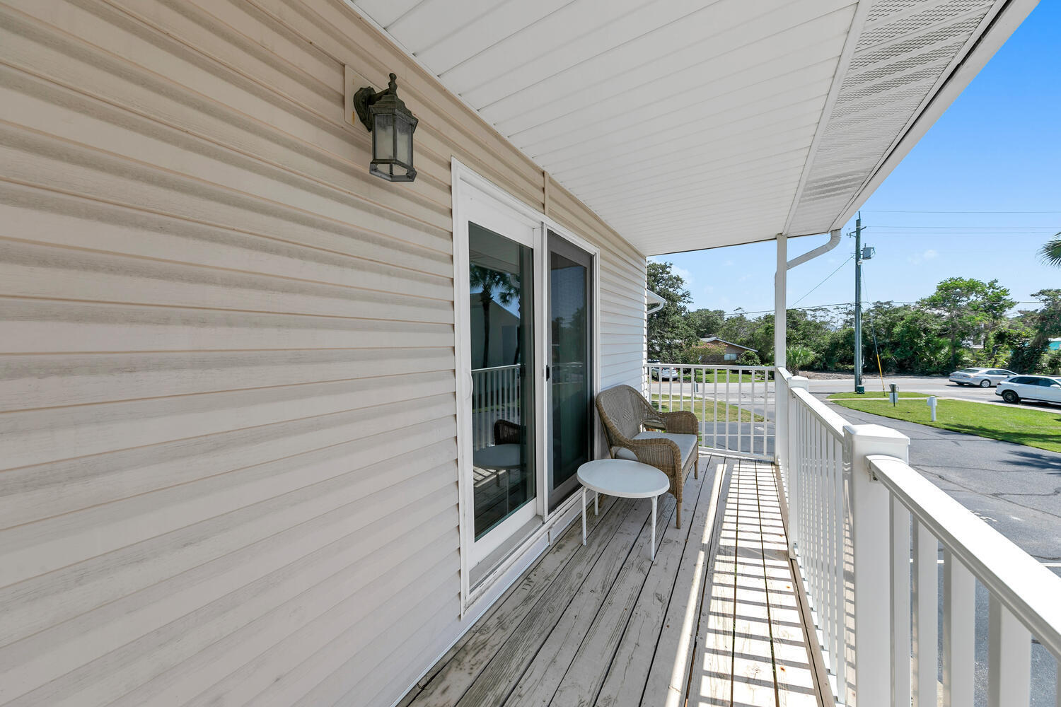 241 Ellis Road, Unit 31 Miramar Beach, FL 32550 - Photo 26 of 30 a view of balcony with wooden floor and fence