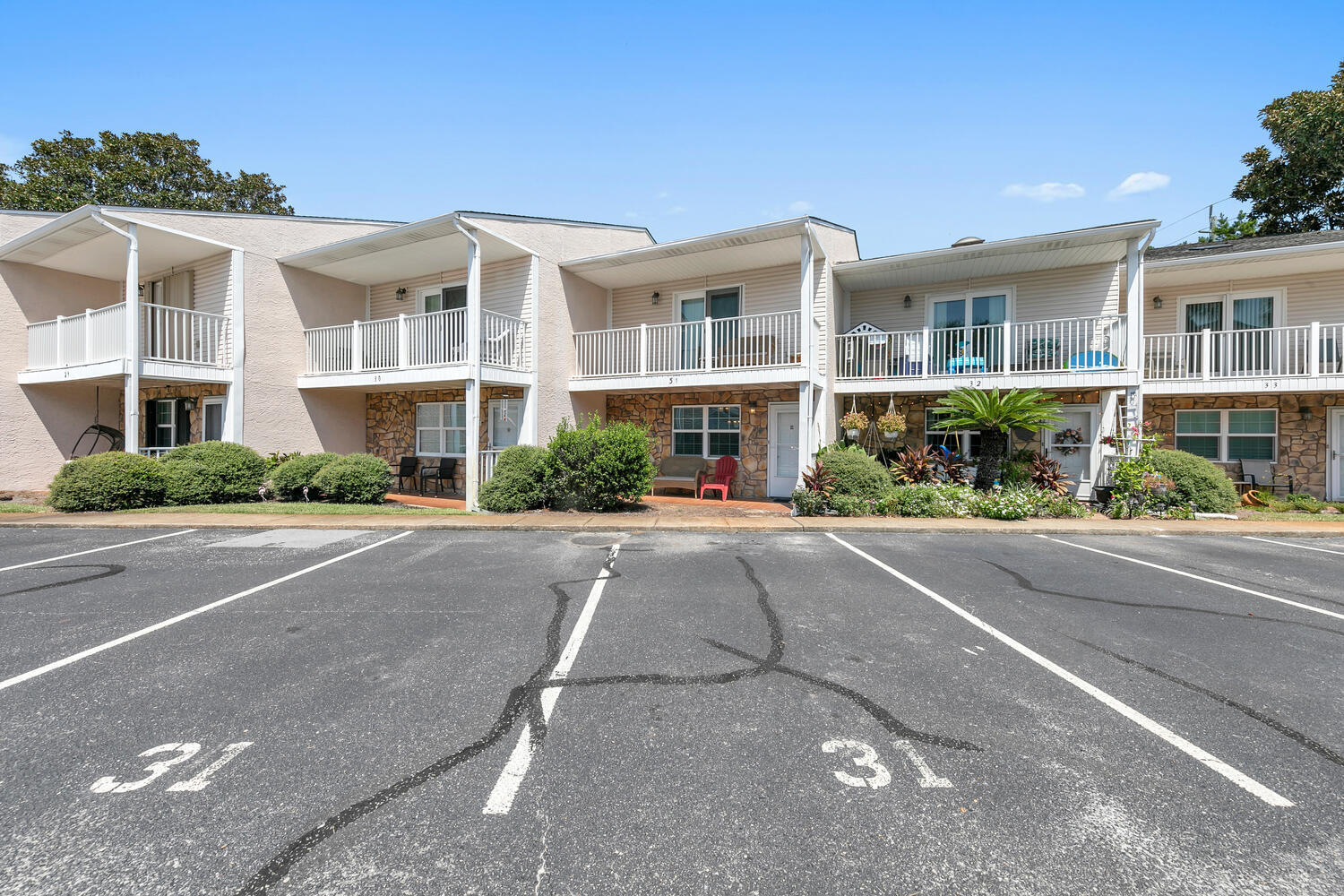 241 Ellis Road, Unit 31 Miramar Beach, FL 32550 - Photo 4 of 30 a front view of a building with street view