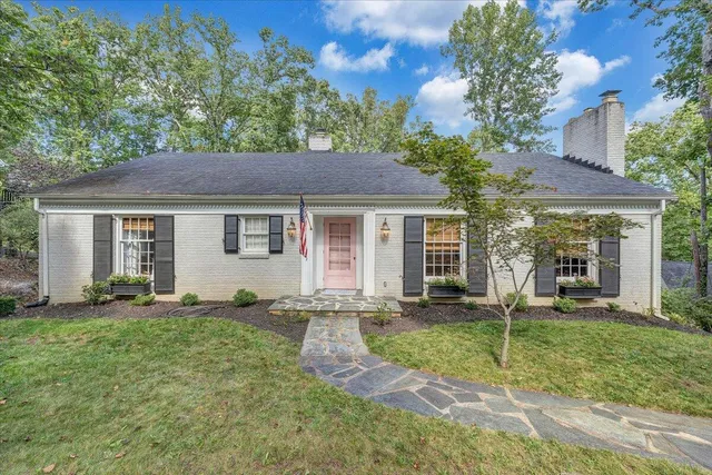 a backyard of a house with seating space