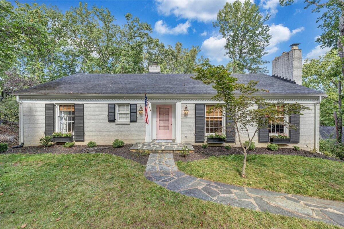 a backyard of a house with seating space