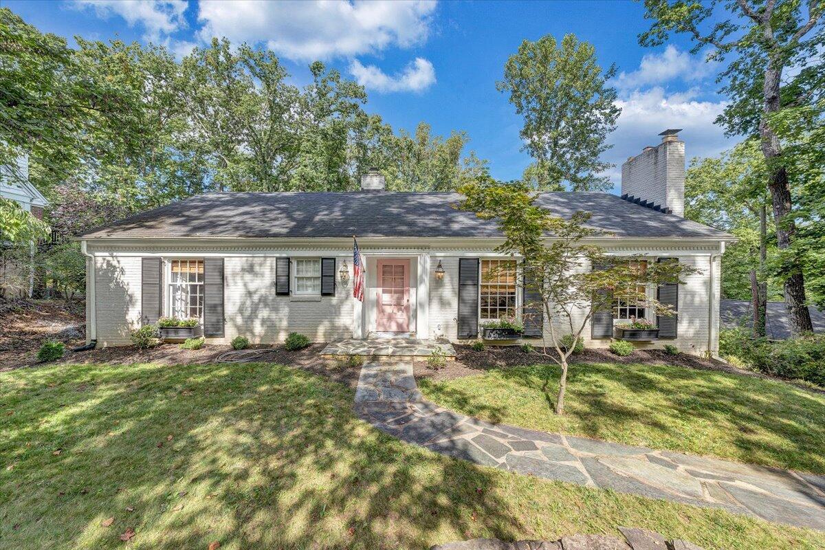 3135 West Ridge Road Southwest Roanoke, VA 24014 - Photo 44 of 50 a front view of house with a garden and patio