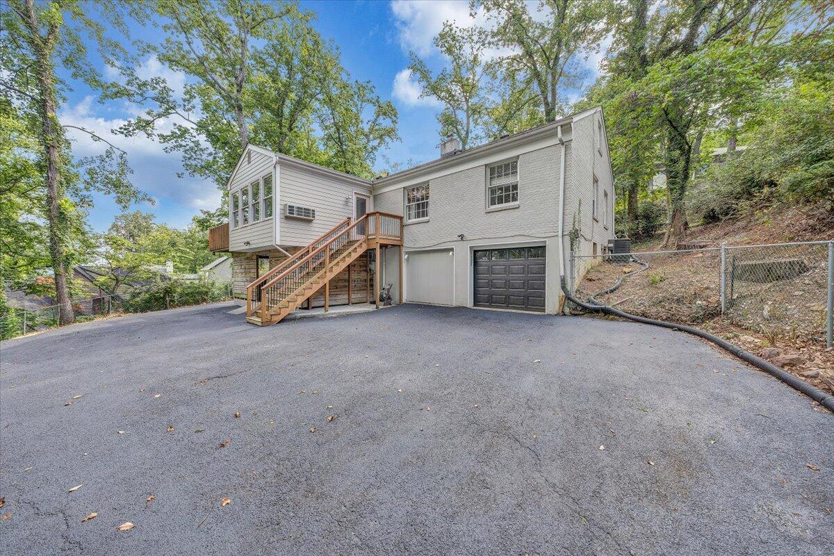 3135 West Ridge Road Southwest Roanoke, VA 24014 - Photo 47 of 50 a view of a house with a yard and large tree