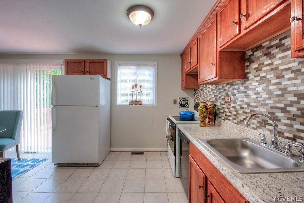 9304 Howze Road Glen Allen, VA 23060 - Photo 7 of 22 New ceramic tile floor (2019)