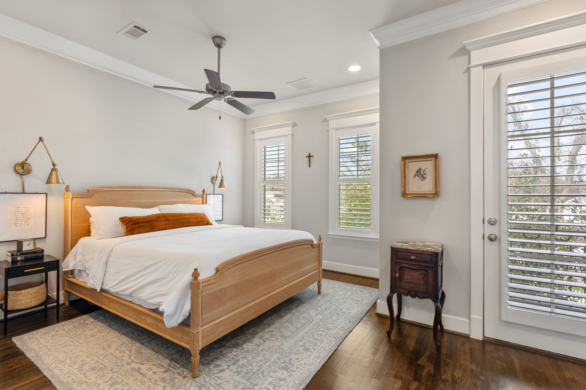 924 Aurora Street Houston, TX 77009 - Photo 21 of 37 With high ceilings, crown molding, and access to a private covered balcony, this is a true owner's retreat.