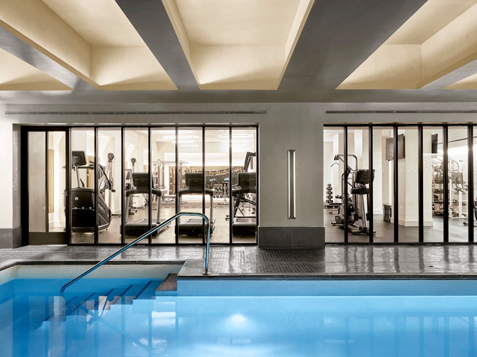 543 West 122nd Street, Unit 8H Manhattan, NY 10027 - Photo 14 of 17 a view of gym equipment with floor to ceiling windows