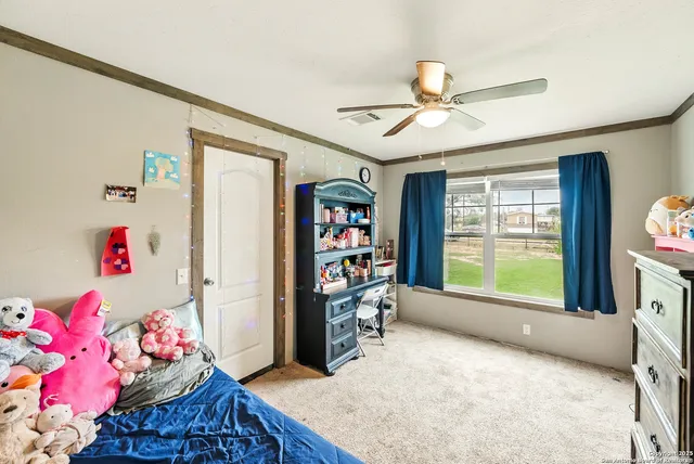 a view of a bathroom from the hallway