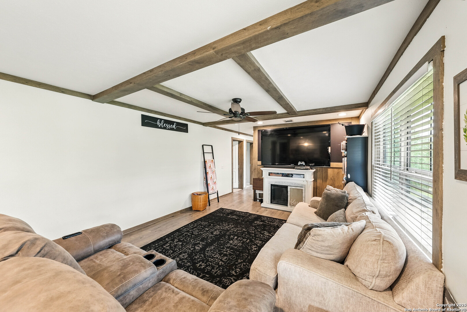 238 Las Palomas Drive Lytle, TX 78052 - Photo 6 of 25 a living room with furniture and a flat screen tv