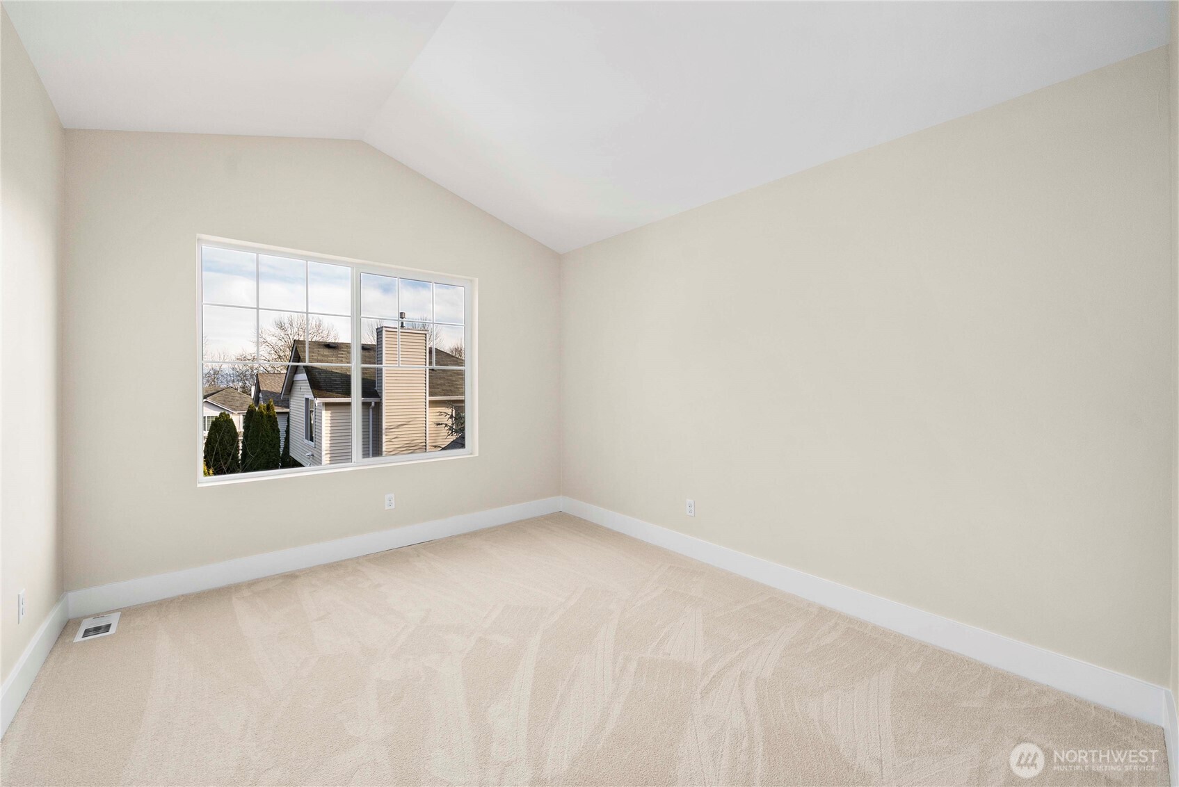 4125 South 220th Place, Unit 26 Kent, WA 98032 - Photo 15 of 39 an empty room with windows