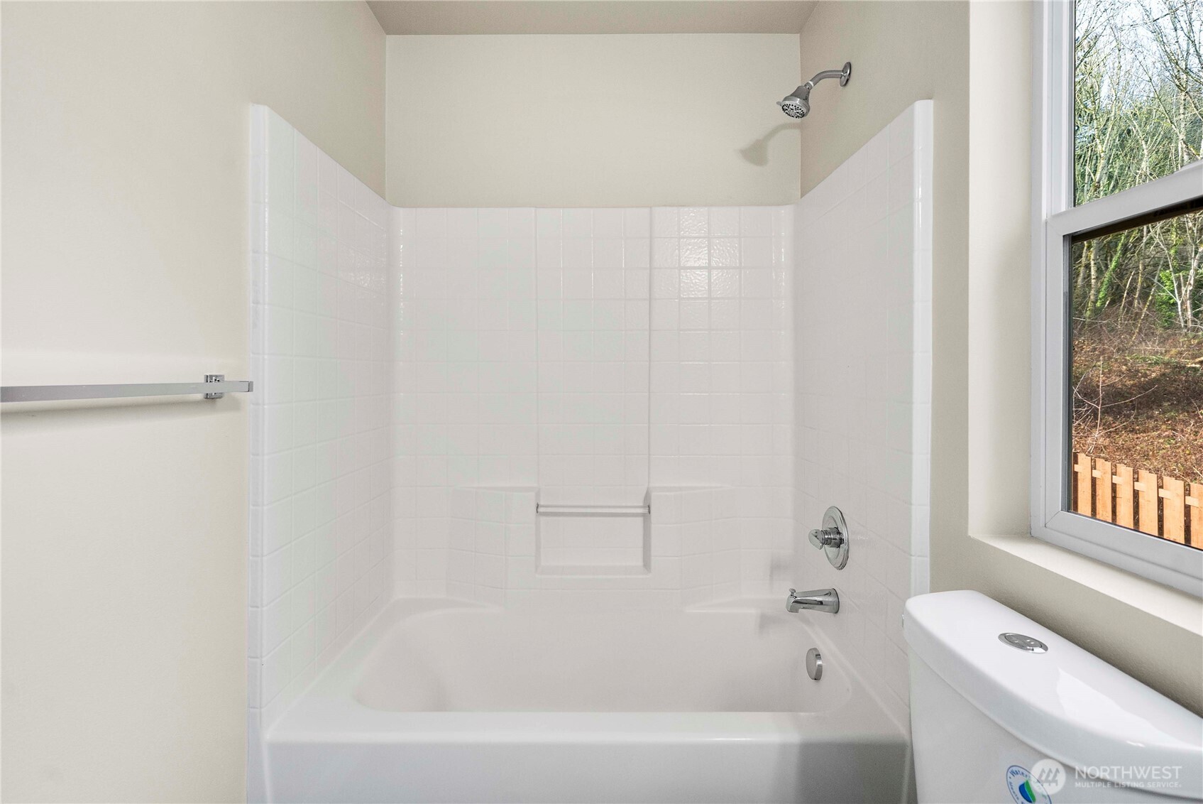 4125 South 220th Place, Unit 26 Kent, WA 98032 - Photo 21 of 39 a bathroom with a bathtub a window and a shower