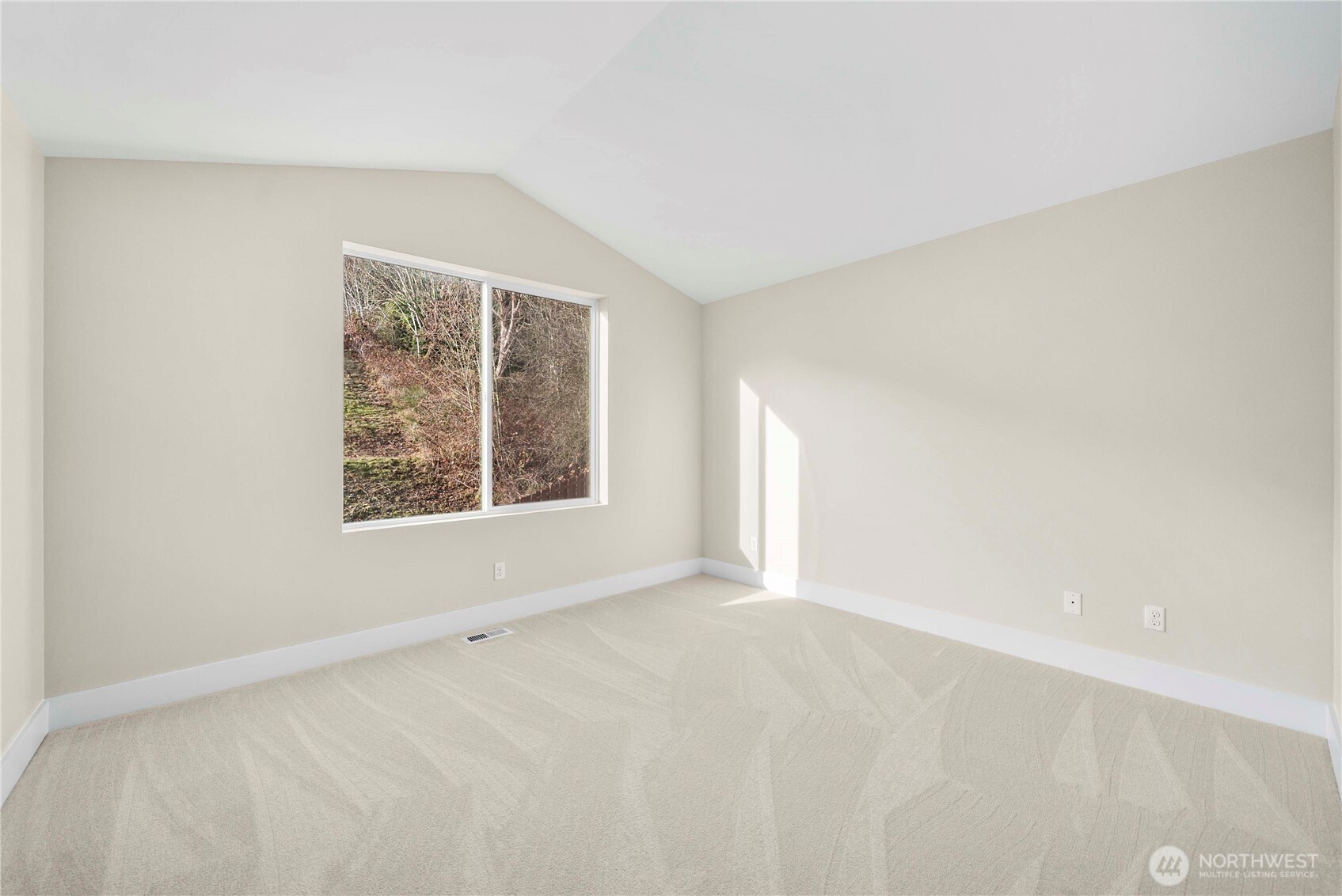 4125 South 220th Place, Unit 26 Kent, WA 98032 - Photo 26 of 39 an empty room with windows