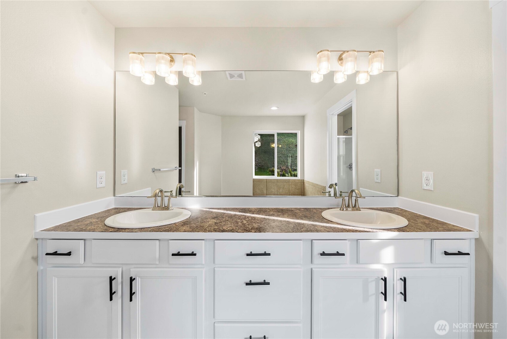 4125 South 220th Place, Unit 26 Kent, WA 98032 - Photo 30 of 39 a bathroom with a granite countertop sink and a mirror