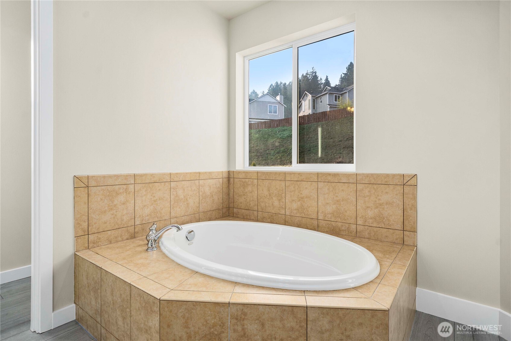 4125 South 220th Place, Unit 26 Kent, WA 98032 - Photo 31 of 39 a bathroom with a sink and a window